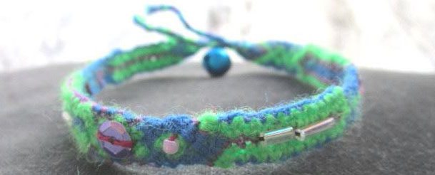 Unique friendship bracelets bespangled with colored beads and accessorized with bell